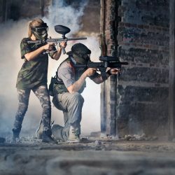 Paintball Team surrounded with smoke, indoor